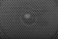 Black speaker grill texture close-up. Background Royalty Free Stock Photo