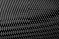 Black speaker grill texture close-up. Background Royalty Free Stock Photo