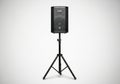 Black speaker on a tripod stand isolated on white background Royalty Free Stock Photo