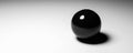 Black sphere on white background minimalistic black and white modern design background 3d render illustration Royalty Free Stock Photo