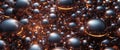 Black spheres connected by thin tubes and illuminated with orange light, close up view. Royalty Free Stock Photo