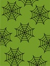 Black spider web patterns are evenly distributed across a green background. Royalty Free Stock Photo