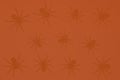 Black spiders on an orange background, gradient background and silhouettes of spiders, festive scary background