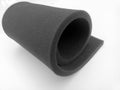 Black sponge foam roll isolated on a white background