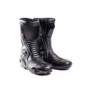 Black sports motorcycle boots. Isolated on a white background Royalty Free Stock Photo