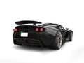 Black sports supercar - taillight view