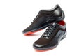 The black sporty shoes isolated on white background Royalty Free Stock Photo