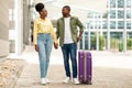 Black Spouses Traveling Standing Holding Hands Posing With Suitcase Outdoors Royalty Free Stock Photo