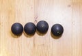 Black squash balls in squash court in tennis club