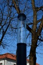 black stainless steel column cylindrical shape. It is a lamp with