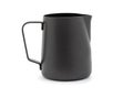 Black stainless steel milk jug.Black stainless steel milk pitcher. Foaming jug for latte art. Barista kit. Royalty Free Stock Photo