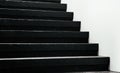 Black stairway steps with white wall - dark shadow monotone image Royalty Free Stock Photo