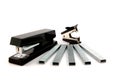 Black stapler, staples and staple remover Royalty Free Stock Photo