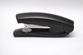 Black stapler on white