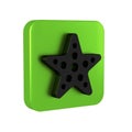 Black Starfish icon isolated on transparent background. Green square button. Royalty Free Stock Photo