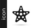 Black Starfish icon isolated on white background. Vector Royalty Free Stock Photo