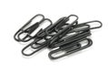Black stationery, office paper clips Royalty Free Stock Photo