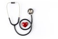 Black stethoscope with red heart of doctor for checkup on white background. Royalty Free Stock Photo