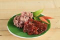 black sticky rice with fried sliced pork and fried chicken mixed garlic ,sesame , black pepper. Royalty Free Stock Photo