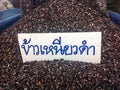 A black sticky rice - Thai market .
