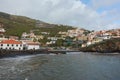 Black stone beach in CÃÂ¢mara de Lobos, Madeira Royalty Free Stock Photo