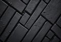 Black stone cement floor. Close up of black tiles made from bricks. Royalty Free Stock Photo