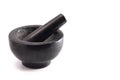 Black Stone Mortar and Pestle Isolated on a White Background Royalty Free Stock Photo