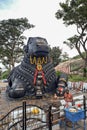 Black stone Nandi bull sits on Chamundi Hill way to Chmudi temple