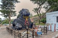 Black stone Nandi bull sits on Chamundi Hill way to Chmudi temple