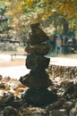 Black stone sculpture stacked in gravity, concept, concentration, effort, success