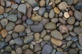 Black stone, Shiny black lava pebbles on the beach, Black lava pebble stone Royalty Free Stock Photo