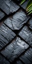 Black Stone Wooden Blocks: Industrial Fragments In Tactile Tabletop Photography