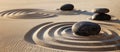 Black stones on sand with pattern. Zen, meditation, harmony