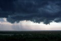 A black storm cloud above the city