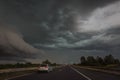 Black storm clouds above highway Royalty Free Stock Photo