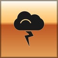 Black Storm icon isolated on gold background. Cloud and lightning sign. Weather icon of storm. Vector Illustration