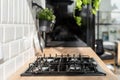 Black stove with burner in modern kitchen interior Royalty Free Stock Photo