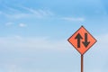 Black straight traffic and go back arrow sign under the blue sky Royalty Free Stock Photo