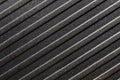Black striped grainy plastic texture background Royalty Free Stock Photo