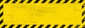 Black Stripped on yellow background. Grunge long plaque with yellow and black stripes and text space.