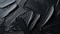 Black strokes of oil paint on the surface, textured background. Royalty Free Stock Photo