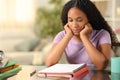 Black student memorizing notes at home Royalty Free Stock Photo