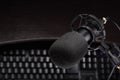 Black studio condenser microphone other computer keyboard Royalty Free Stock Photo
