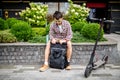Black stylish retro vintage backpack. Bag with leather trim, roll-top clasp. Urban rucksack. Travel haversack. Drawstring knapsack