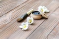 Black substance in wooden jar on a wooden background. Royalty Free Stock Photo