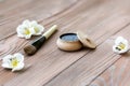 Black substance in wooden jar on a wooden background. Royalty Free Stock Photo