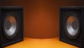 Black subwoofer speaker car audio music system on orange background