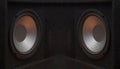 Black subwoofer speaker car audio music system on orange background Royalty Free Stock Photo
