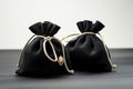 Black suede fabric bags with laces, decorated with stones and amulets for jewelry