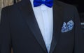 Classic style black suit blue bowtie elegant menswear